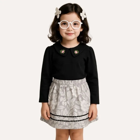 Polo Negro con Flor Bordada - Compostura